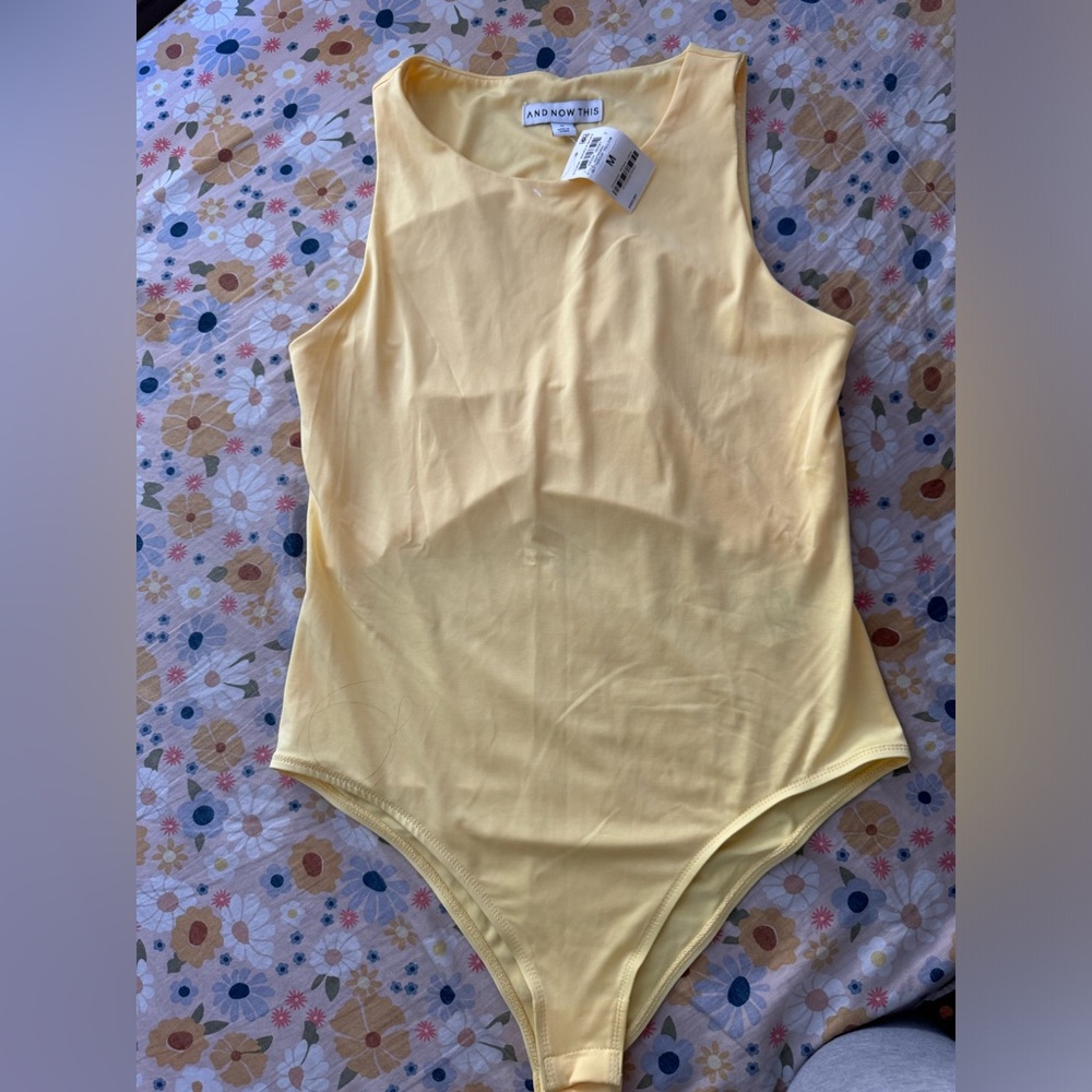 Womens yellow bodysuit